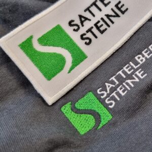Logo Sattelberger Steine Textil.